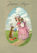 Fille et lapin &eacute;changent des &oelig;ufs color&eacute;s